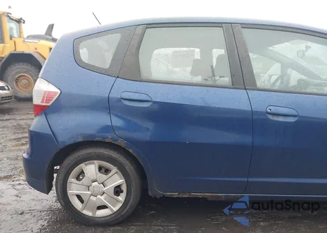 2009 Honda Fit from USA, damaged, VIN JHMGE87229S039551